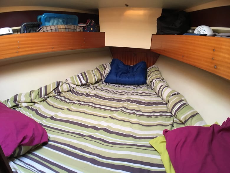 V-berth forward cabin on a sailing yacht V-berth forward cabin on a sailing yacht